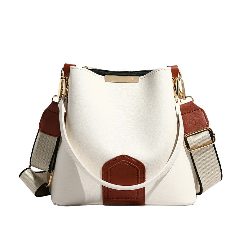 Nuevo y moderno bolso cubo cruzado — Un bolso de mano y de hombro versátil y elegante