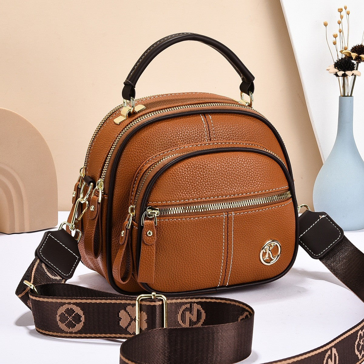 Bolso bandolera y de hombro popular de cuero