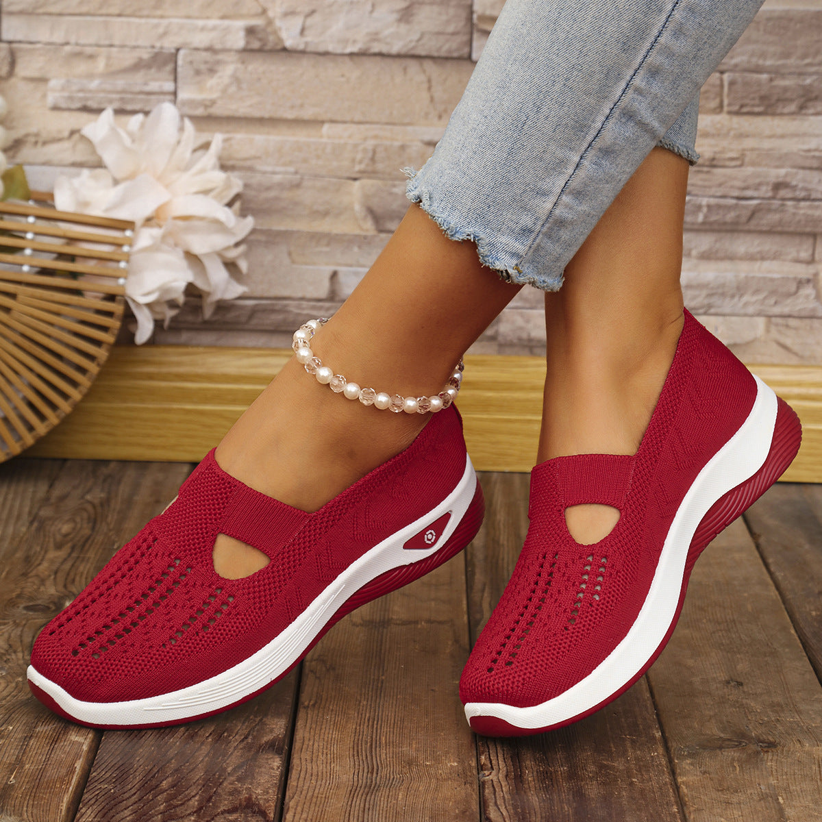 Zapatillas de malla Flyknit transpirables con diseño calado.