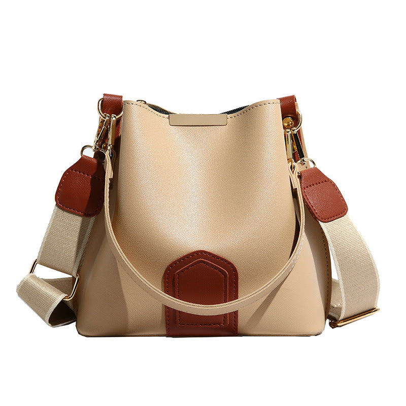 Nuevo y moderno bolso cubo cruzado — Un bolso de mano y de hombro versátil y elegante
